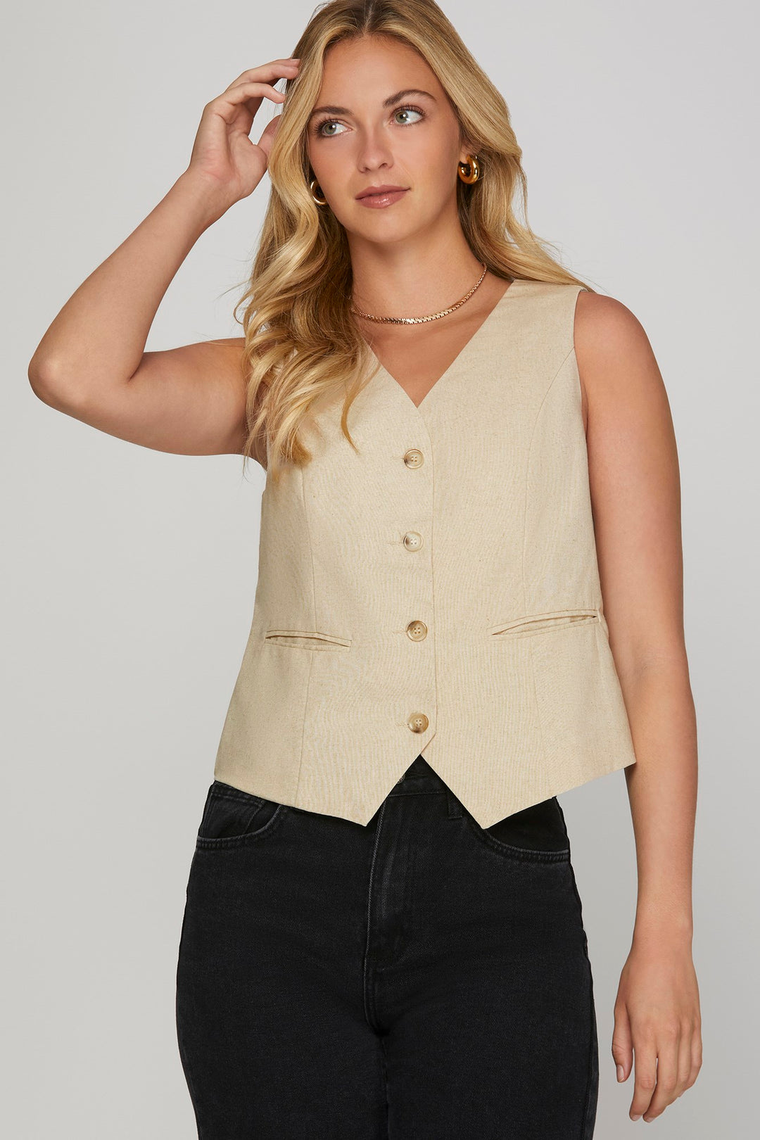 Sleeveless button down vest