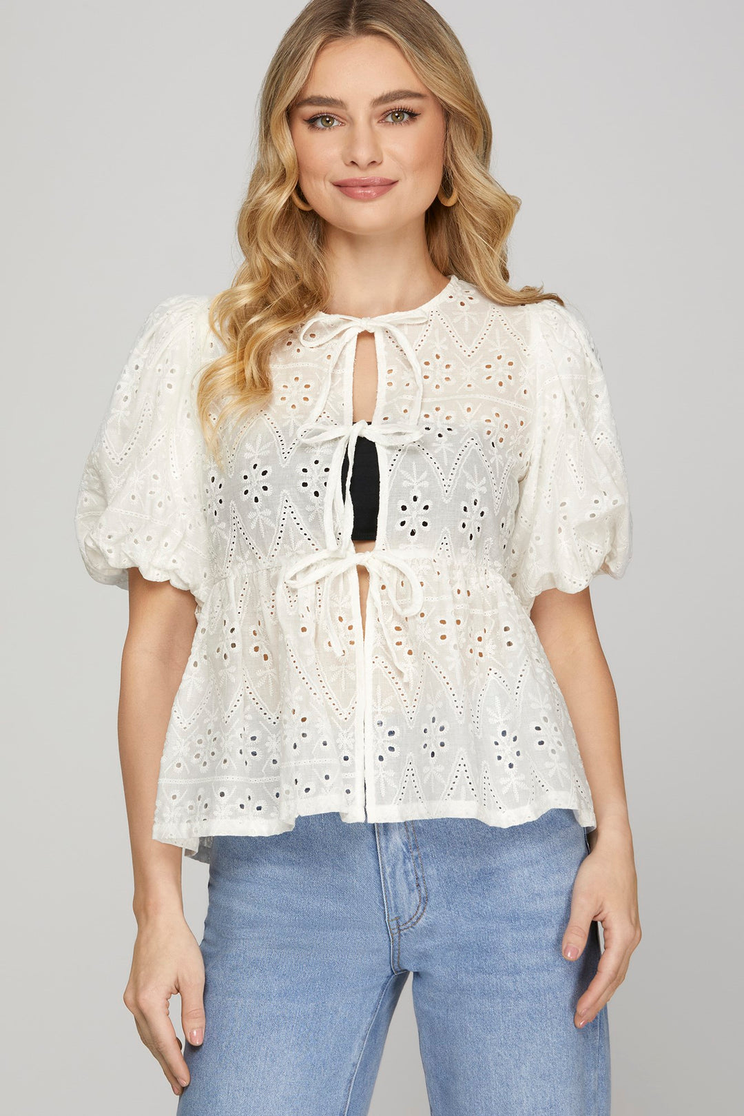 Puff sleeve bow front tie eyelet peplum top