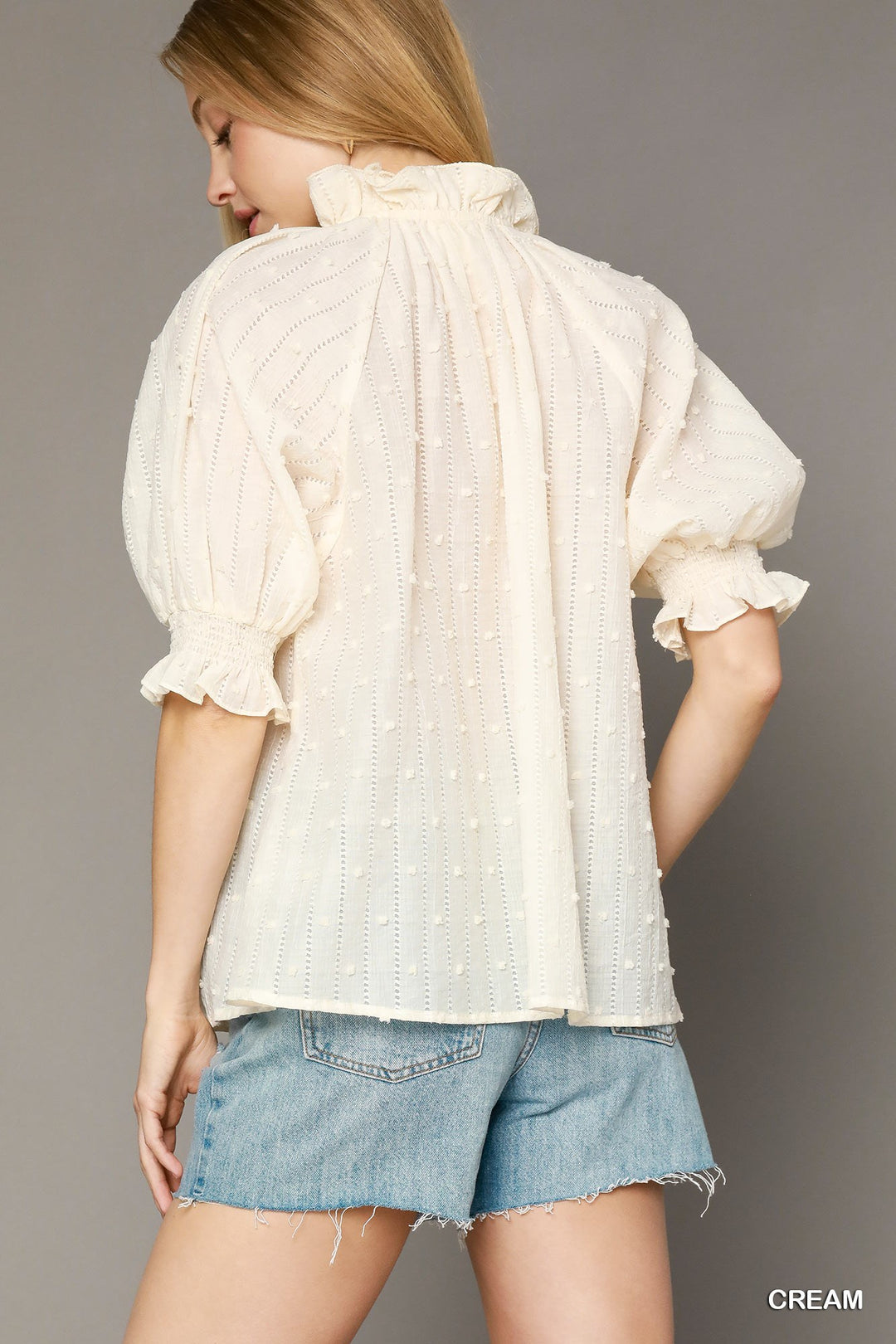 Ruffle detailed textured top